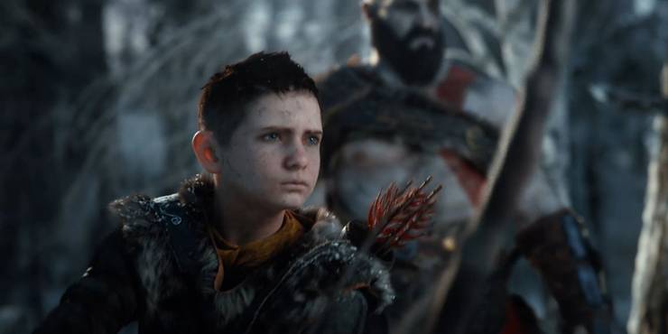 Uma imagem de Atreus com Kratos ao fundo.